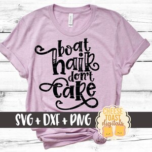 May include: A pink t-shirt with the text "boat hair don't care" in black. The shirt is on a white wood background. The text "SVG + DXF + PNG" is below the text on the shirt. A small logo with the text "CHEESE TOAST digitals" is in the bottom right corner of the image.