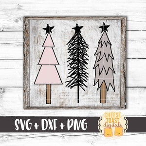 May include: A digital download of three Christmas tree SVG files. The trees are in a pink, black, and gray color scheme. The trees are on a white wood background with a sign that says "SVG + DXF + PNG" and "CHEESE TOAST digitals".