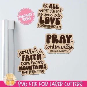 May include: Three wooden signs with inspirational quotes and scripture verses. The signs are brown with black lettering. The first sign says "Let all that you do be done with love, I Corinthians 16:14". The second sign says "Pray continually, I Thessalonians 5:17". The third sign says "Your faith can move mountains, Matthew 17:20".