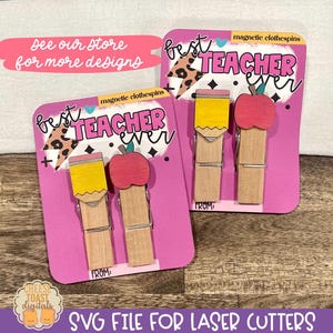 May include: Two pink cards with the text "Best Teacher Ever" and a pencil and apple design. The cards are for magnetic clothespins. The text "See our store for more designs" is on a pink banner at the top of the image.