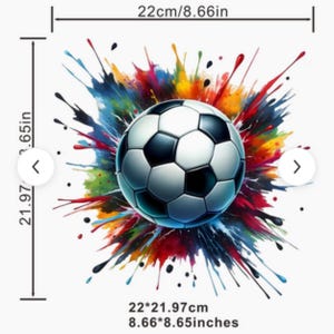 May include: A football with black and white panels is set against a colourful explosion of paint splatters. The design measures 22cm wide and 21.97cm high.
