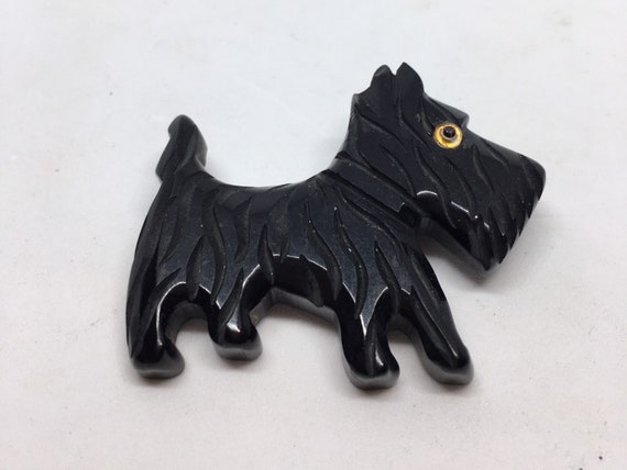 Sweet black Bakelite carved scotty dog brooch