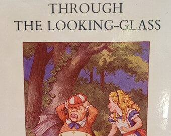 1977 deluxe edition of Through the Looking Glass and What Alice Found There by Lewis Carroll and John Tenniel.