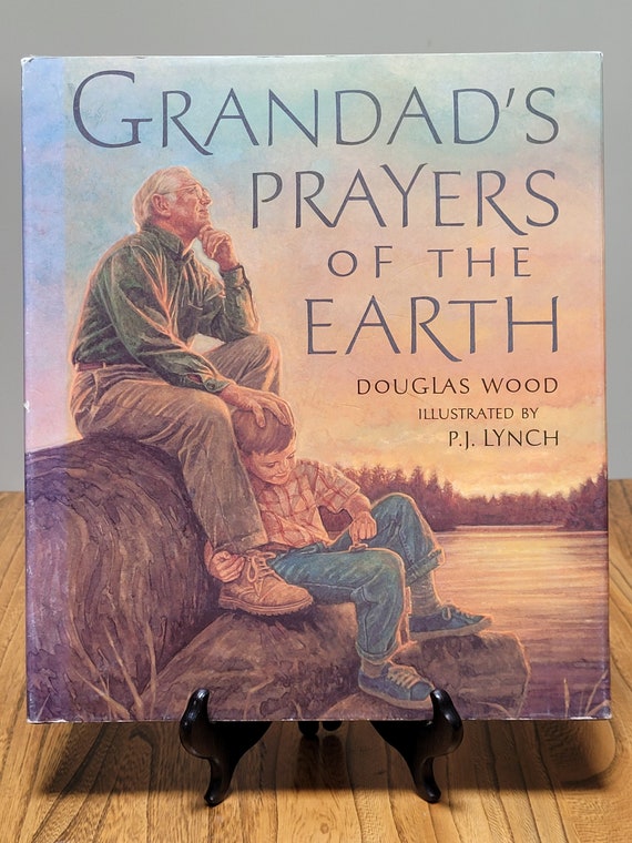 Grandad's Prayers of the Earth by Douglas Wood, illustrated by P. J. Lynch, 1999 edition.