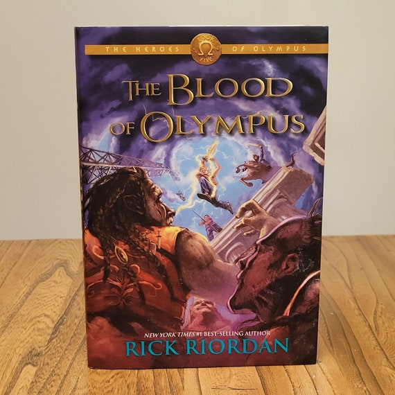 The Blood of Olympus, Book 5 of the Heroes of Olympus by Rick Riordan, 2014 first edition.
