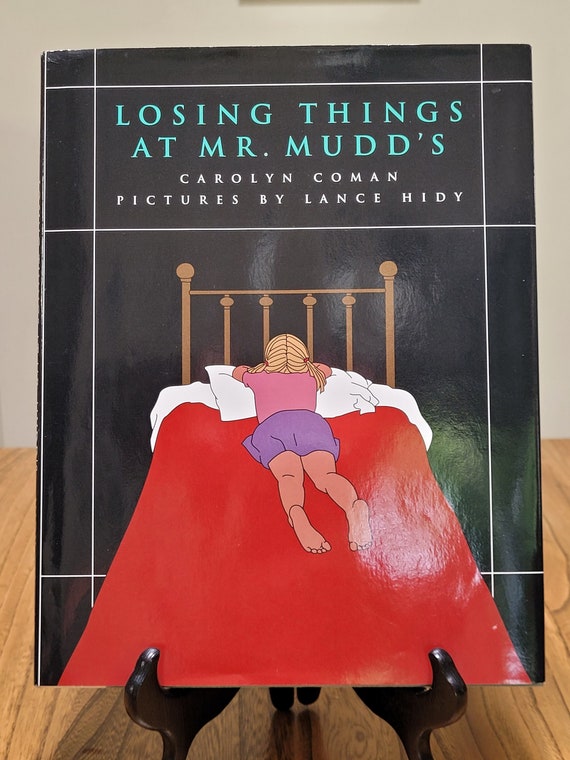 Losing Things at Mr. Mudd's by Carolyn Coman and Lance Hidy, 1992 first edition.