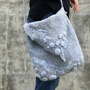 Blue hand-felted designer bag.