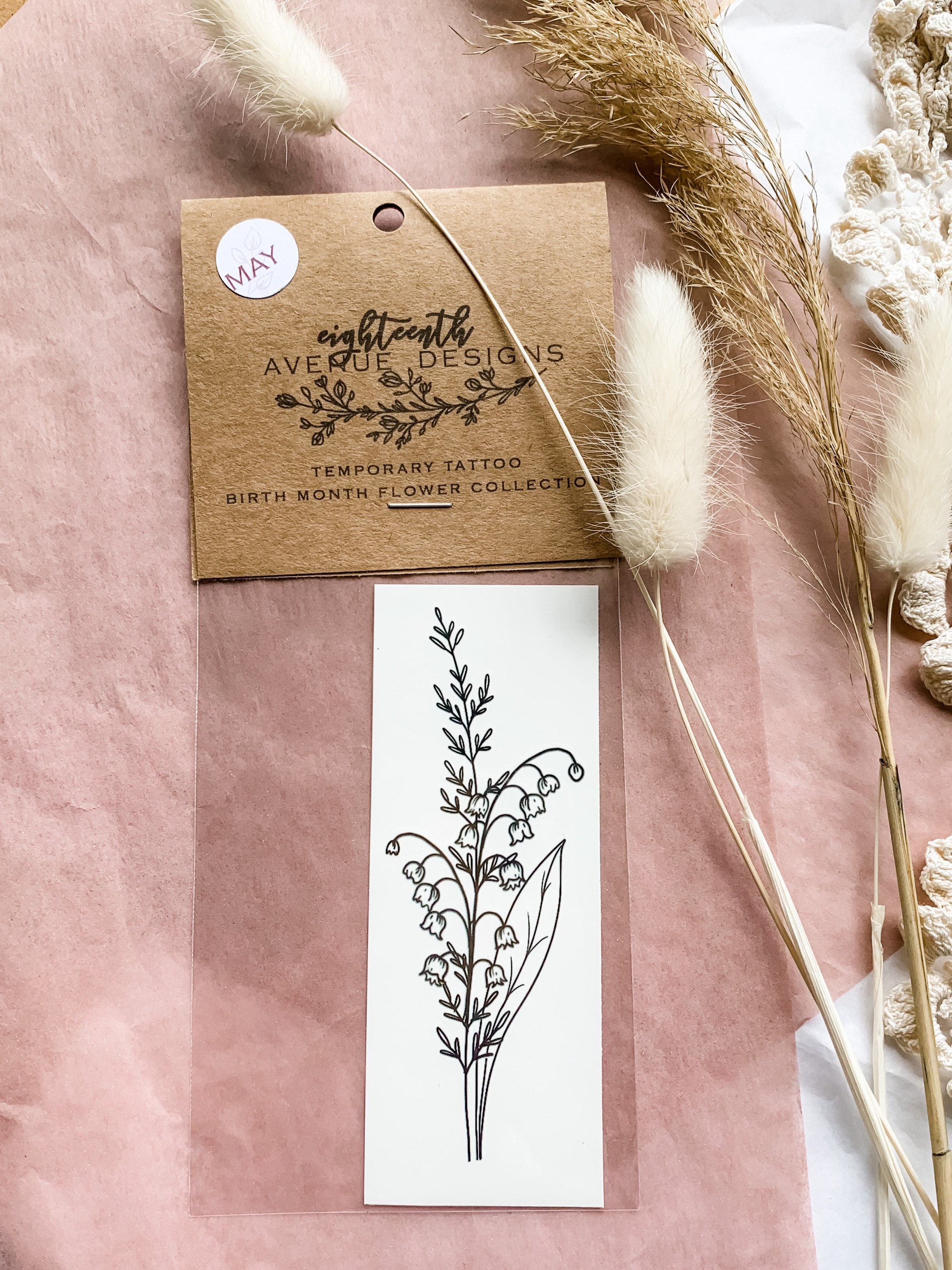 May’s Floral Charm: Lily of the Valley Tattoos