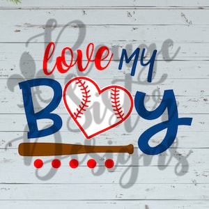 May include: A blue and red graphic design with the text "love my boy" and a baseball heart. The design is on a white wood background.
