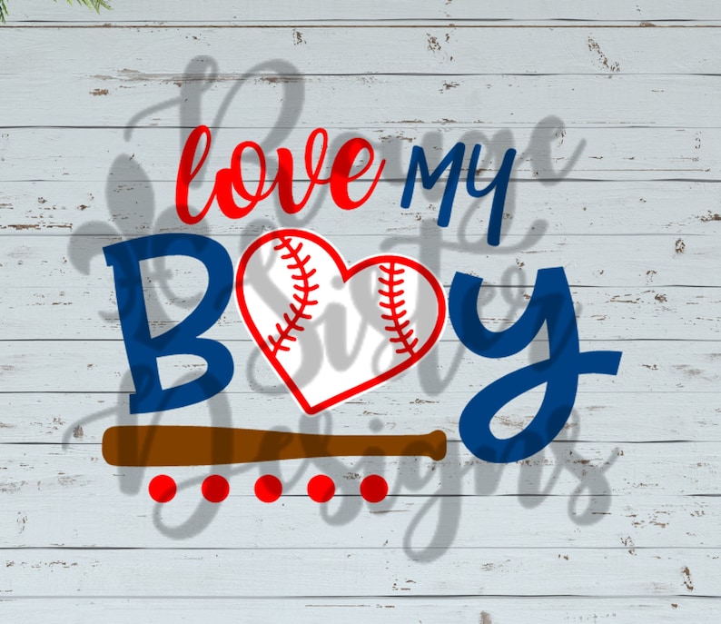 May include: A blue and red graphic design with the text "love my boy" and a baseball heart. The design is on a white wood background.
