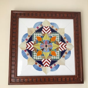 Mandala mosaic.  Large Stained Glass Mandala Mosaic handmade.  Framed with oak wood.  Colorful glass mandala mosaic.