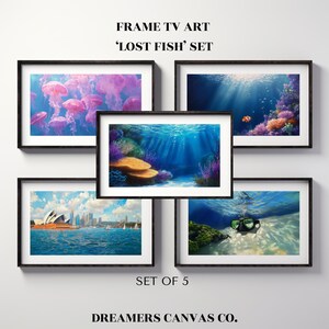 May include: Set of 5 framed art prints featuring underwater scenes, including jellyfish, coral reefs, and a diver's mask. The art prints have black frames and are labeled "LOST FISH" and "DREAMERS CANVAS CO."