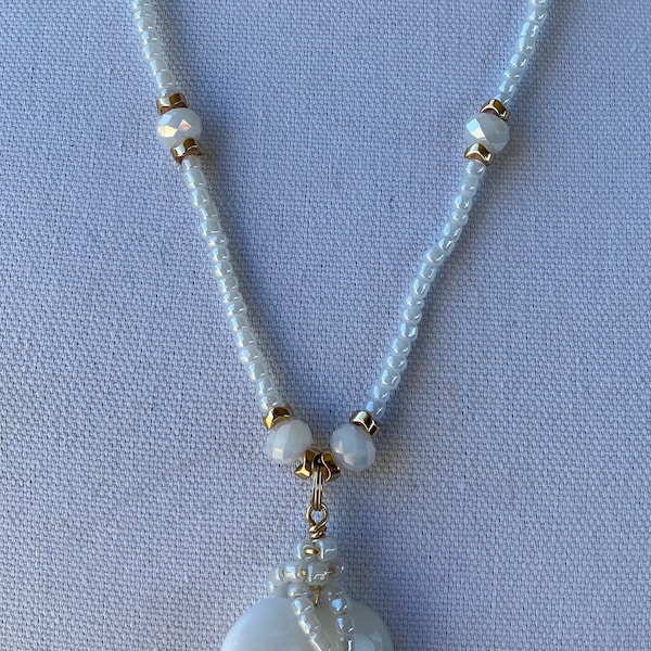 Woman’s white necklace 26 inches long