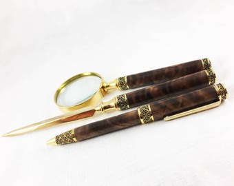Sculptured Gold Figured Black Walnut Letter Opener, Magnifying Glass and Wood Pen Desk Set
