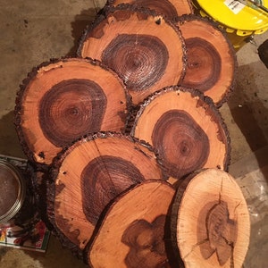 Coaster bottoms are sealed but not finished.