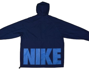 May include: A navy blue hooded jacket with a large blue "NIKE" logo on the back.