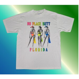 Murina&#39;s Best -1990 Vintage- Männer Kurzarm &quot;No Place Butt Florida&quot; Grafik-T-Shirt (Weiß, Groß, L)