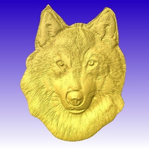 Puede incluir: Una talla en relieve dorada y detallada de la cabeza de un lobo. La escultura presenta intrincados detalles del pelaje, los ojos y la nariz del lobo, sobre un fondo azul degradado. La obra de arte es una representación tridimensional del animal.