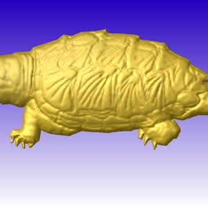 May include: A golden 3D printed model of a snapping turtle with a long tail and a detailed shell.
