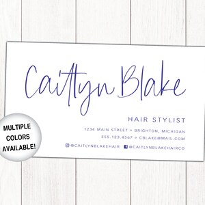 May include: A white business card with blue text. The card reads "Caitlyn Blake, Hair Stylist" and includes contact information: 1234 Main Street, Brighton, Michigan, 555.123.4567, cblake@mail.com, @caitlynblakehair, @caitlynblakehairco. A blue circle with white text reads "Multiple Colours Available!"