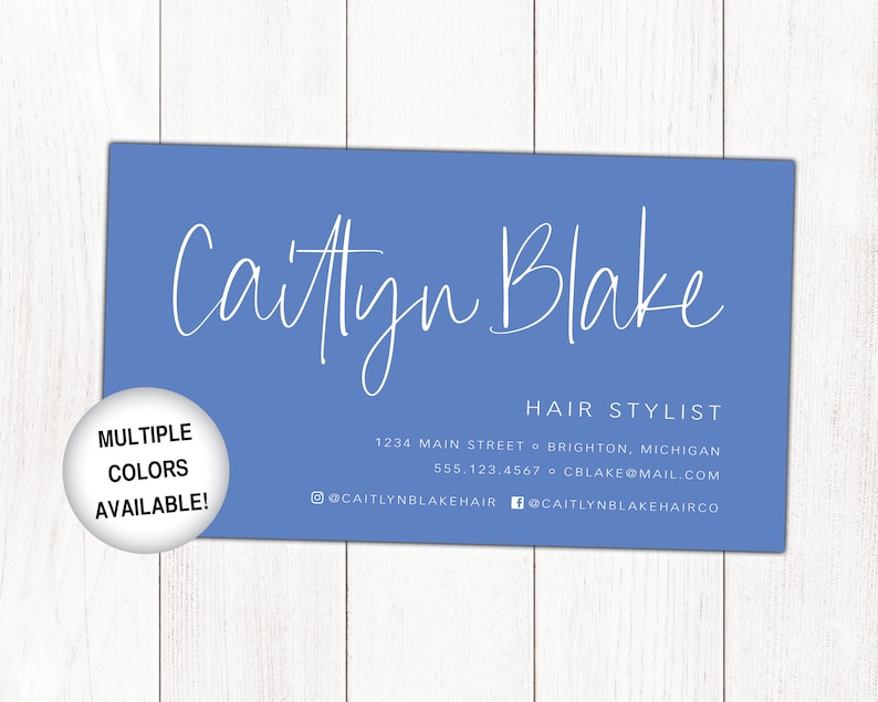 May include: Blue business card with white text for Caitlyn Blake, Hair Stylist. The card includes the business address, phone number, email address, and social media handles.