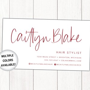 May include: A white business card with red text. The text reads "Caitlyn Blake, Hair Stylist, 1234 Main Street, Brighton, Michigan, 555.123.4567, CBlake@mail.com, @CaitlynBlakeHair, fCaitlynBlakeHairCo".