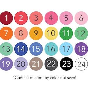 May include: A chart of 24 color swatches, each with a white circle containing a number from 1 to 24. The colors range from red to purple, with shades of orange, yellow, green, blue, and gray.