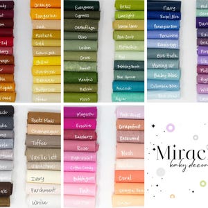 May include: A collection of 100 felt squares in various colors, including burgundy, orange, evergreen, grass, navy, mist blue, black, magenta, pink frost, and more. The felt squares are arranged in rows and columns, and each square has a name written on it in white text. The text "Miracle baby decor" is written in white text on a white background in the bottom right corner of the image.