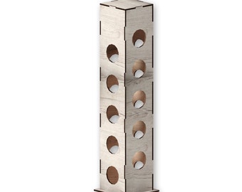 May include: A wooden wine bottle holder with six circular openings. The holder is light brown with a wood grain pattern.
