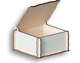 May include: A white wooden box with a decorative, scalloped edge and a hinged lid. The lid is open, revealing the empty interior of the box.