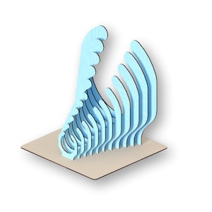 May include: A light blue wooden sculpture of a wave, with a layered design. The sculpture is standing on a beige base.