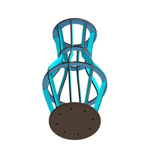 May include: A blue and brown vase with a geometric design. The vase is made of wood and has a round base.