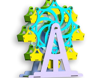 May include: A wooden toy Ferris wheel with a light blue wheel and yellow gondolas. The wheel is mounted on a purple stand.