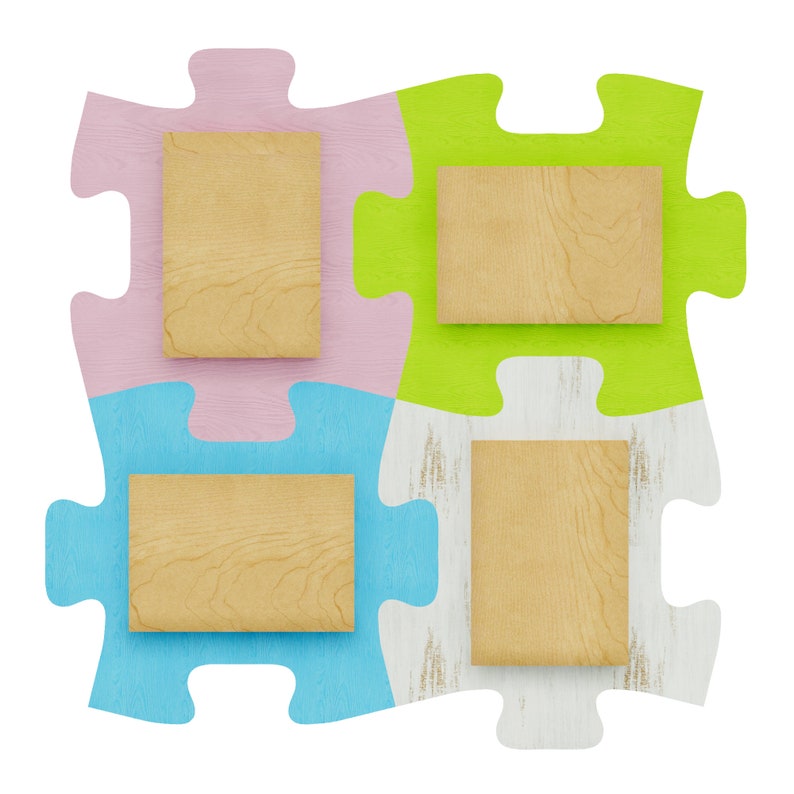 K&ouml;nnte beinhalten: Vier Holzbilderrahmen in verschiedenen Farben, rosa, gr&uuml;n, blau und wei&szlig;, in Puzzleform angeordnet.