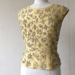 exquisite heavily hand beaded vintage blouse..