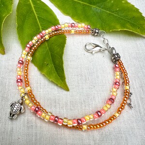 Turtle beaded bracelet, beachy stackable pink orange yellow dual strands bracelet