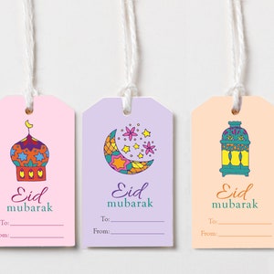 May include: Three pink, purple, and orange gift tags with different illustrations. Each tag has the text "Eid Mubarak" and space for writing "To:" and "From:".