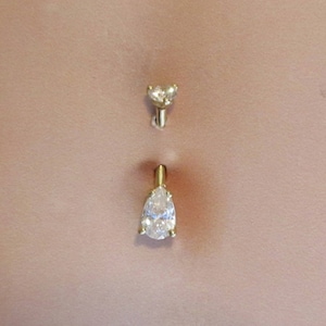 14k solid gold (nickel free) navel ring with Pear Shape Cz.Internally Threaded..14g