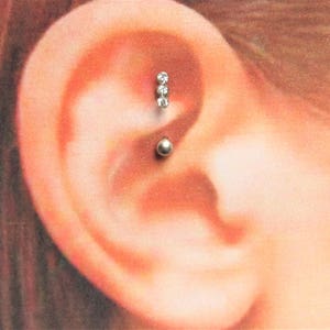 Rook Piercing Surgical Steel Triple cz Curved Barbell..16g..8mm