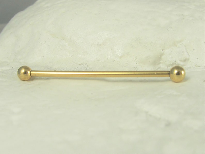 Golden industrial Barbell..Plated Surgical steel..14g..35mm