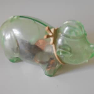 A Little Piggy Bank in Green Plastic - so Cute!
