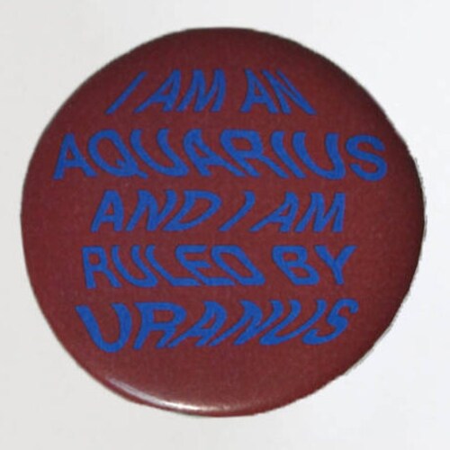 Groovy "I Am An Aquarius And I Am Ruled By Uranus" Zodiac Astrology Button