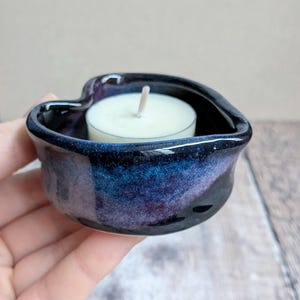 Ceramic black heart shaped tealight with blue and purple patches