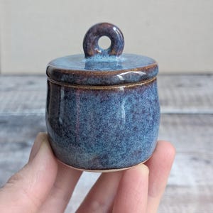 Very small handmade blue purple ceramic lidded pot