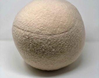 Handmade ball cushion in France in champagne pink wool 35cm in diameter padded with recycled polyester filling