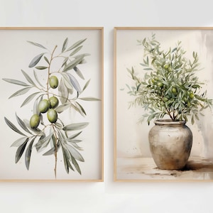 Peut inclure: Deux peintures &agrave; l'aquarelle encadr&eacute;es de branches d'olivier. La peinture de gauche montre une seule branche avec des olives vertes. La peinture de droite montre un olivier en pot avec des olives vertes.