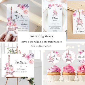 May include: A set of printable bridal shower party decorations featuring a pink and white Eiffel Tower design with floral accents. The set includes a welcome sign, invitations, cupcake toppers, and a menu card. The text on the invitations reads "Oh La La" and the text on the welcome sign reads "Welcome to Rebecca's Bridal Shower".