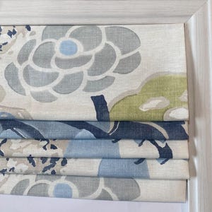 Anna French for Thibaut Laura Roman Shade Shown in Citrus and Blue other colors available