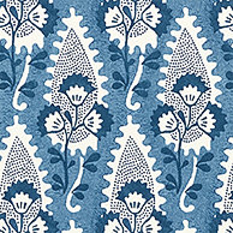 May include: A blue and white paisley pattern fabric with a repeating design of stylized flowers and leaves.