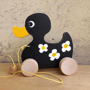 Wood pull toy Duck in Black, handmade custom wooden toy for toddlers, personalized push animal toy on wheels